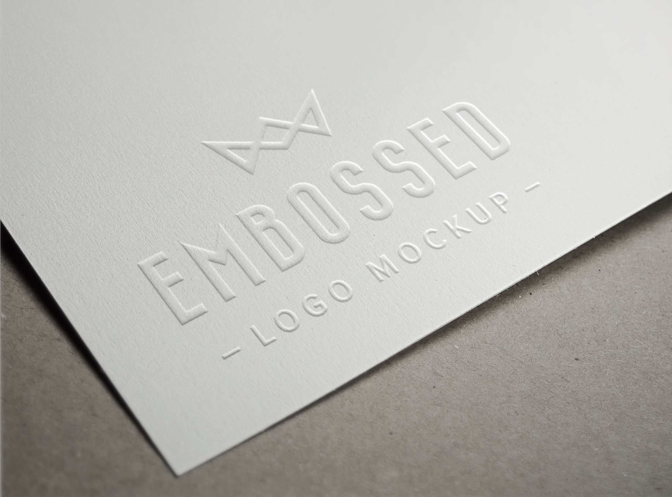 Embossed Paper Logo MockUp | GraphicBurger